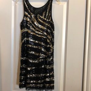 Black and gold sequin dress